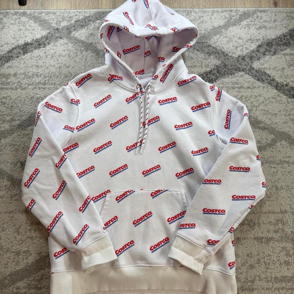 Costco AOP logo hoodie size medium. Tag cut off. Small stain on wrist